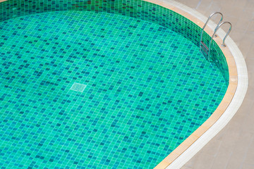 Fototapeta na wymiar Beautiful outdoor swimming pool in hotel resort for holiday vacation