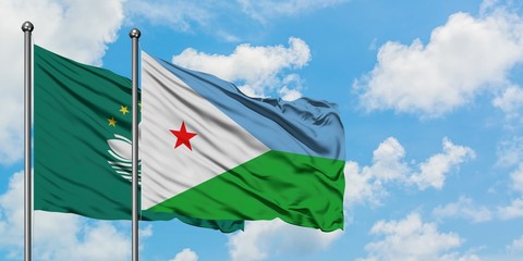 Macao and Djibouti flag waving in the wind against white cloudy blue sky together. Diplomacy concept, international relations.