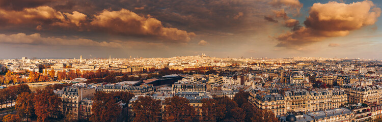 Obraz premium Aerial panorama of Paris City in late autumn from Eiffel Tower at sunset.