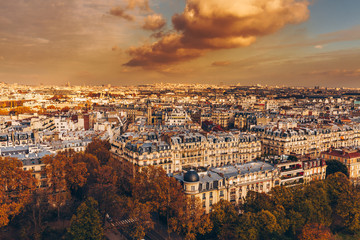 Aerial panorama of Paris City in late autumn from Eiffel Tower at sunset.