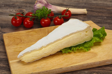 Brie cheese triangle served salad