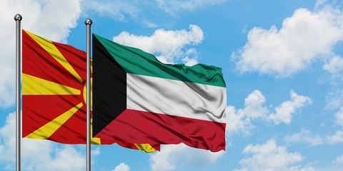 Macedonia and Kuwait flag waving in the wind against white cloudy blue sky together. Diplomacy concept, international relations.