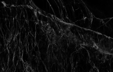 Natural black marble with beautiful patterns used for design and decoration.