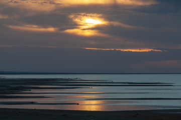 Fototapeta na wymiar Bright sunset on a lake in Mongolia