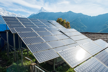 Solar cell panels installation on the high mountains in Annapurna sanctuary of Nepal with...