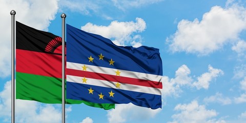 Malawi and Cape Verde flag waving in the wind against white cloudy blue sky together. Diplomacy concept, international relations.