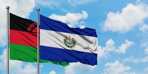 Malawi and El Salvador flag waving in the wind against white cloudy blue sky together. Diplomacy concept, international relations.