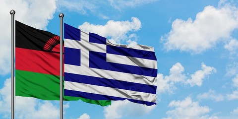 Malawi and Greece flag waving in the wind against white cloudy blue sky together. Diplomacy concept, international relations.