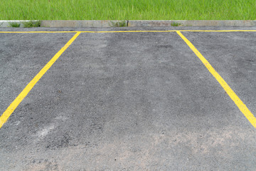 yellow lines parking on asphalt background