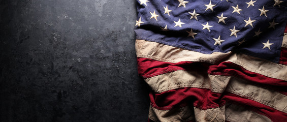 US American flag on worn black background. For USA Memorial day, Veteran's day, Labor day, or 4th...