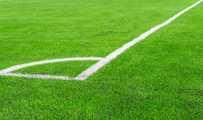White line of  Artificial grass soccer field,corner soccer field.It made to look like natural grass. It is most often used in arenas for sports that were originally or are normally played on grass.