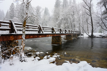 Long Exposure of Driving Snow and Bridge Over The Merced River