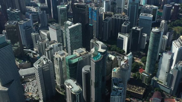 View from above, stunning aerial view of the Kuala Lumpur city skyline with modern and futuristic skyscrapers. Kuala Lumpur commonly known as KL, is the national capital of Malaysia.