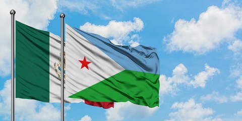 Mexico and Djibouti flag waving in the wind against white cloudy blue sky together. Diplomacy concept, international relations.