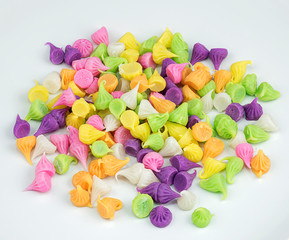 The word LOVE made from Thai candy. Colorful Thai desserts on white background .Thai candy called A-lua. Close up image of colorful Thai dessert, sweet, candy, caramel. Top view