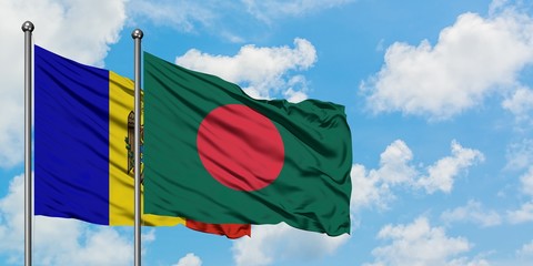 Moldova and Bangladesh flag waving in the wind against white cloudy blue sky together. Diplomacy concept, international relations.