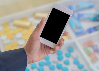 White smartphone with black blank in Hand businessman. business communication concept.