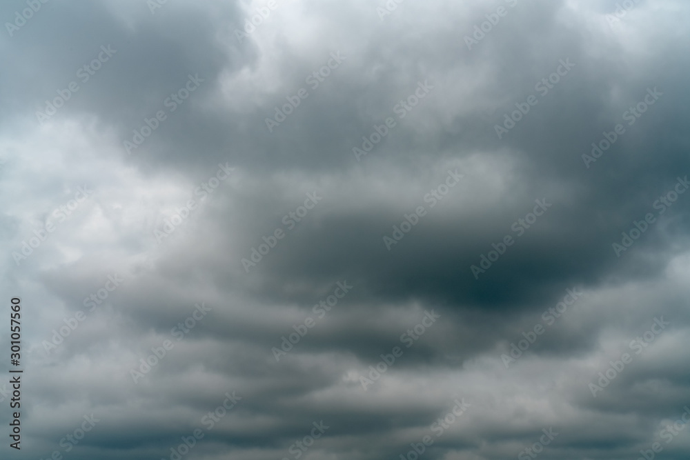 Wall mural grey storm rain clouds or nimbus on sky