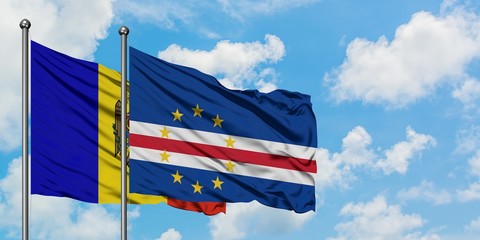 Moldova and Cape Verde flag waving in the wind against white cloudy blue sky together. Diplomacy concept, international relations.