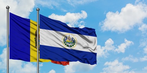 Moldova and El Salvador flag waving in the wind against white cloudy blue sky together. Diplomacy concept, international relations.