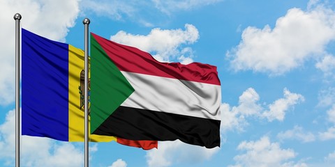 Moldova and Sudan flag waving in the wind against white cloudy blue sky together. Diplomacy concept, international relations.
