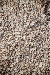 Pebble stone background.Small colorful pebbles background, simplicity, daylight, stones.smooth waterworn pebble use for garden decoration.Relaxing on the beach.abstract background with round peeble