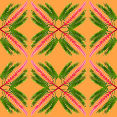 tropical exotic plant leaf,green leaves pattern are made new color for nature concept,abstract background for textile and fabric design,isolated on orange background