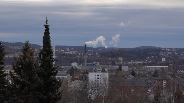 Video of a industrial chimney in eastern part of Oslo. This is in Oslo, Norway in November. Its cold and dark, and the snow have not yet arrived.