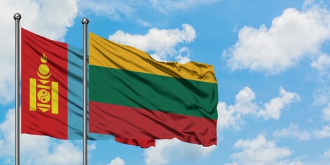 Mongolia and Lithuania flag waving in the wind against white cloudy blue sky together. Diplomacy concept, international relations.