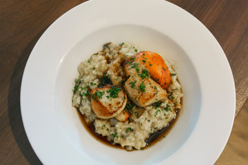 Delicious homemade grilled giant scallops with rice in Portree , Isle of Skye , Scotland