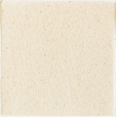background and texture of stretch marks cracked on white cream glazed tile