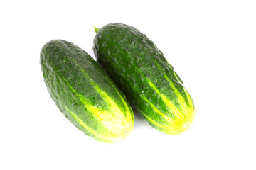green cucumbers on a white background