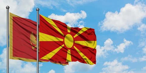 Montenegro and Macedonia flag waving in the wind against white cloudy blue sky together. Diplomacy concept, international relations.