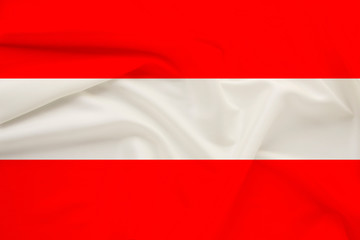 national flag of Austria on delicate silk with wind folds, travel concept, immigration, politics