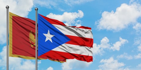 Montenegro and Puerto Rico flag waving in the wind against white cloudy blue sky together. Diplomacy concept, international relations.