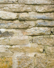 Stone Background of old vintage dirty brick wall with peeling plaster, texture.