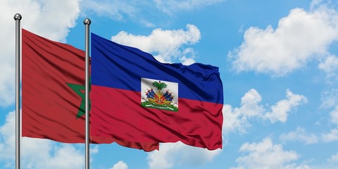 Morocco and Haiti flag waving in the wind against white cloudy blue sky together. Diplomacy concept, international relations.