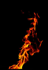 Beautiful yellow, orange and red blaze fire flames.  Isolated on black background.