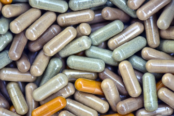 Close up Pills in plastic package. Heap of medical pills Herbal medicines in capsule. Concept of healthcare and medicine.