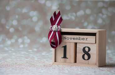 image of Latvian flag symbols on the calendar in honor of the declaration of independence of Latvia on November 18