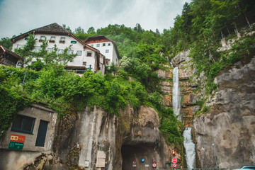 building at the cliff edge summer time hallstatt austria