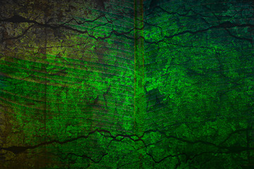 Fototapeta premium Abstract bright green background in grunge style. The texture of the stone and concrete with cracks. Creative background with multi-exposure effect
