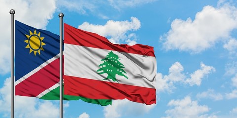 Namibia and Lebanon flag waving in the wind against white cloudy blue sky together. Diplomacy concept, international relations.