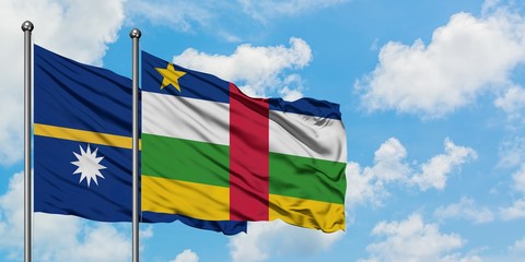 Nauru and Central African Republic flag waving in the wind against white cloudy blue sky together. Diplomacy concept, international relations.