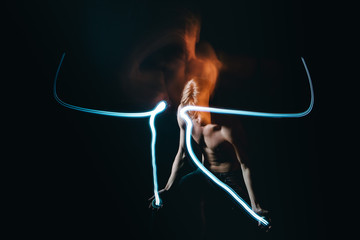 Play with fire.  Emotional metaphorical expression of feelings. . Long exposure artistic photo
