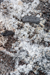 Ashes burned in the grill