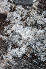 Ashes burned in the grill