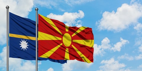 Nauru and Macedonia flag waving in the wind against white cloudy blue sky together. Diplomacy concept, international relations.