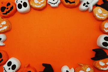 Halloween Concept with pumpkin decorate on space copy orange background