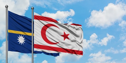Nauru and Northern Cyprus flag waving in the wind against white cloudy blue sky together. Diplomacy concept, international relations.